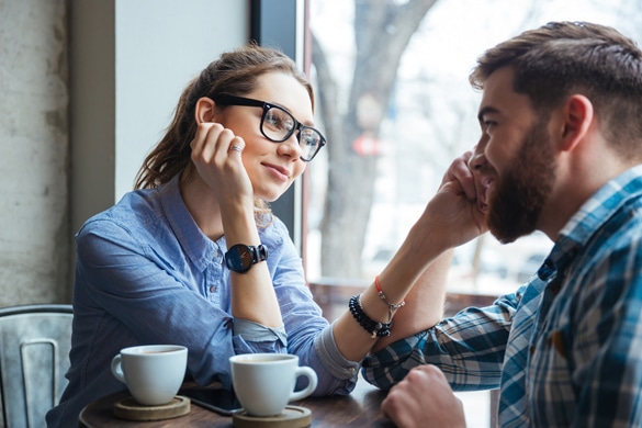 portrait-of-young-beautiful-couple-on-a-date-drinking-coffee-in-cafe